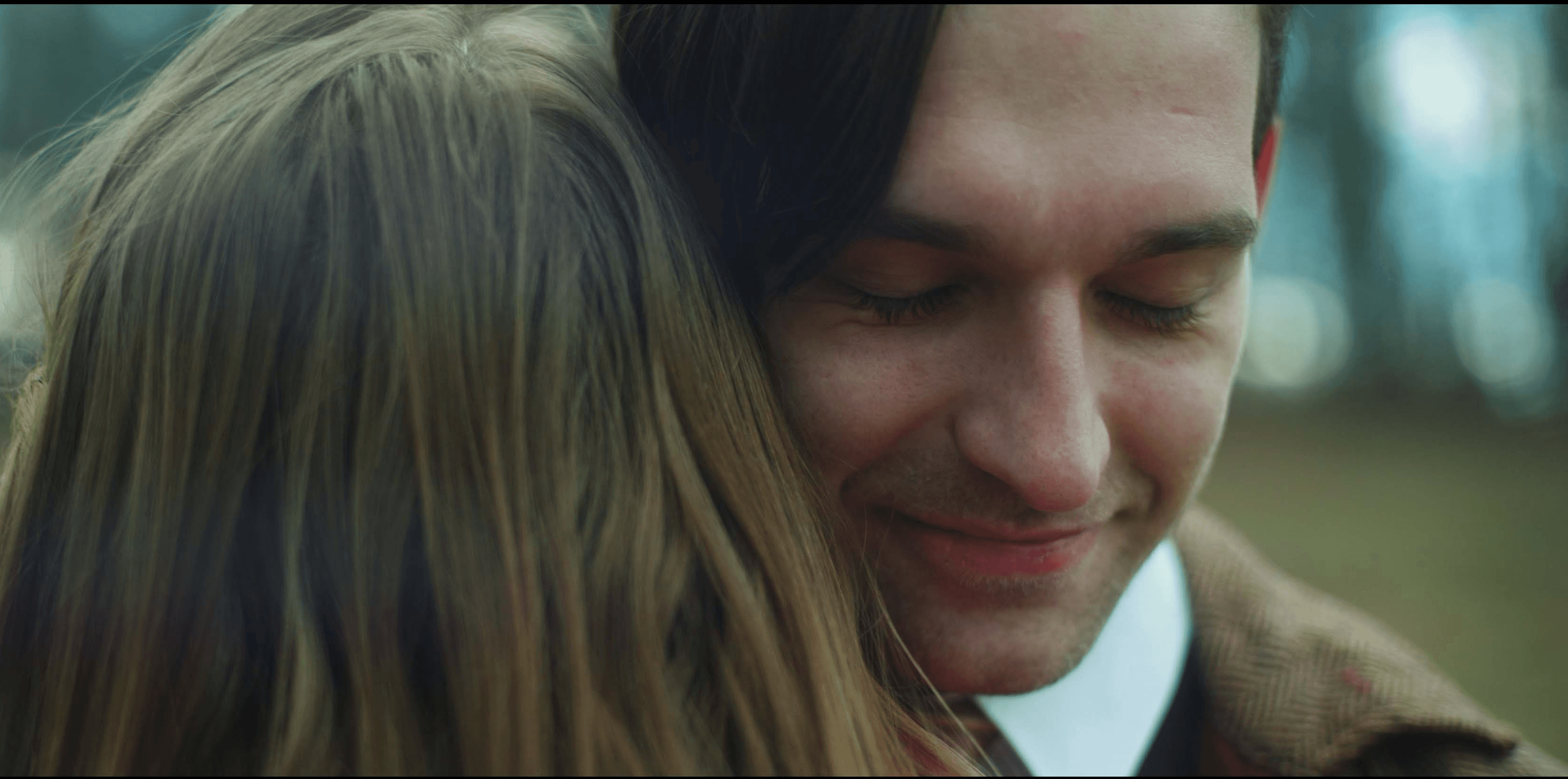 Front cover image for a short film made for Alzheimer's Association. The image is of two people embracing.