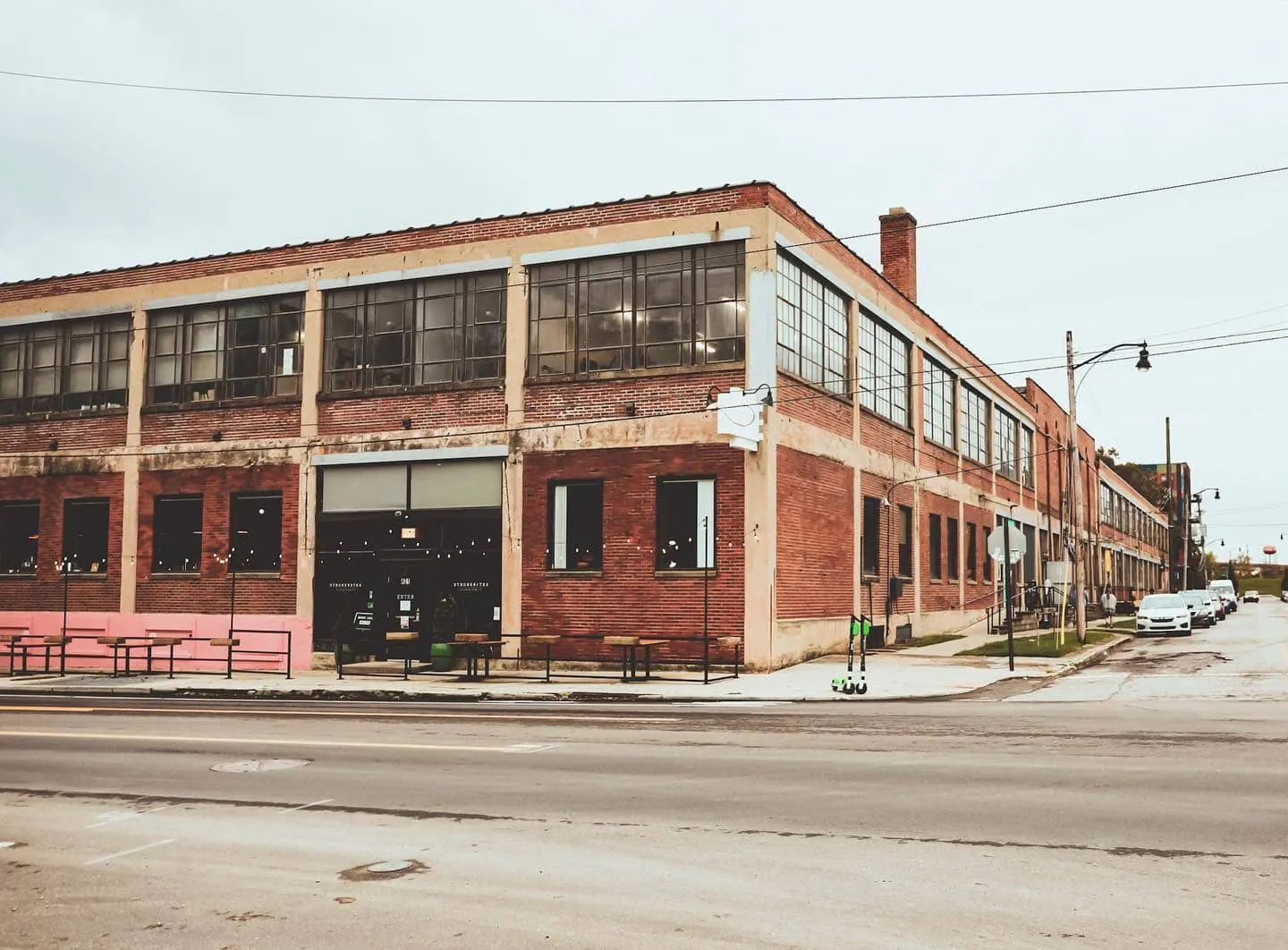 Brick corner building at 401 W. Town St. that houses Strongwater