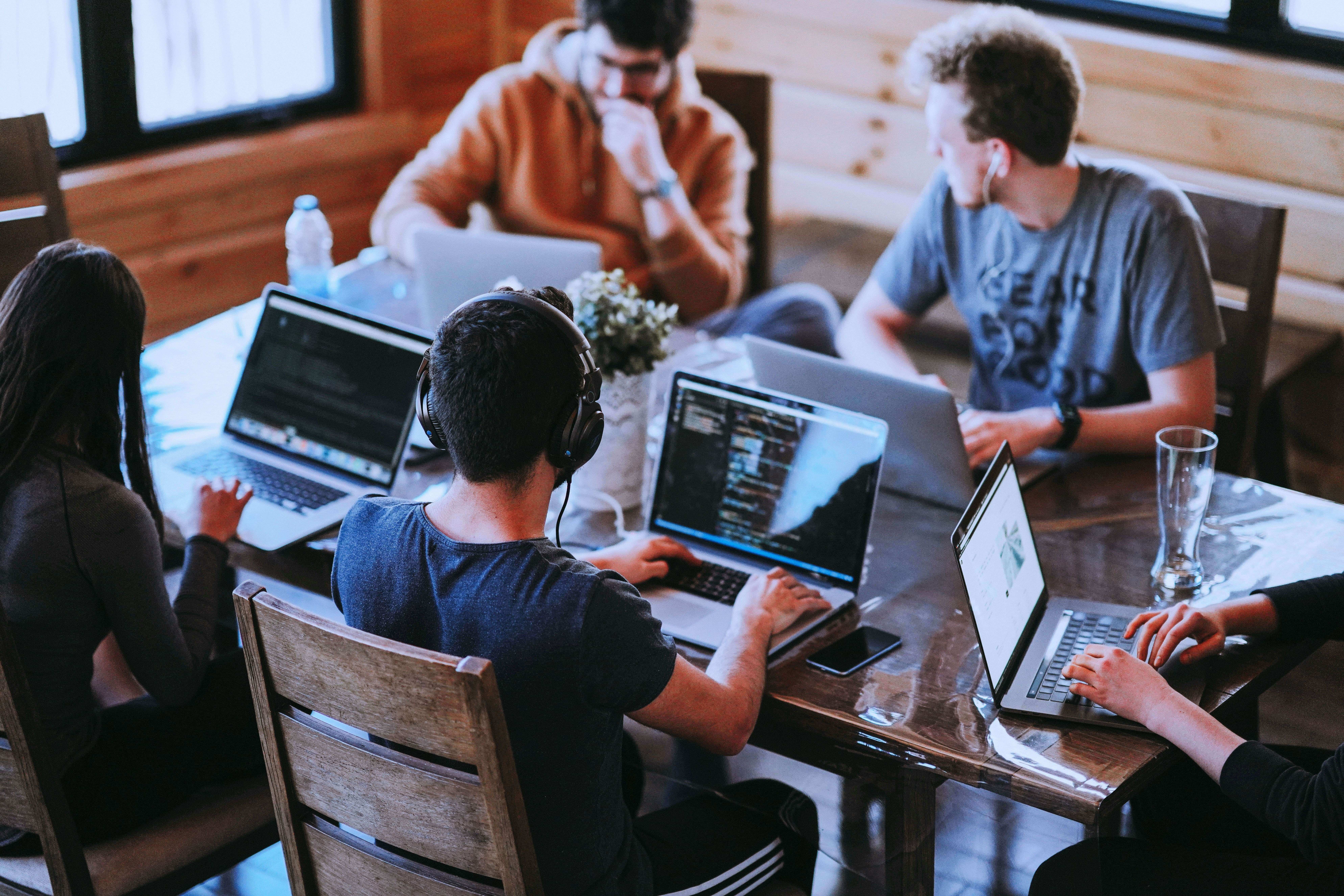 team workspace with people working