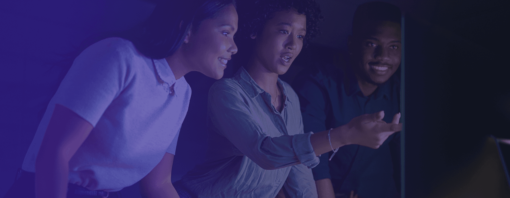 Woman gestures while explaining something at a presentation.