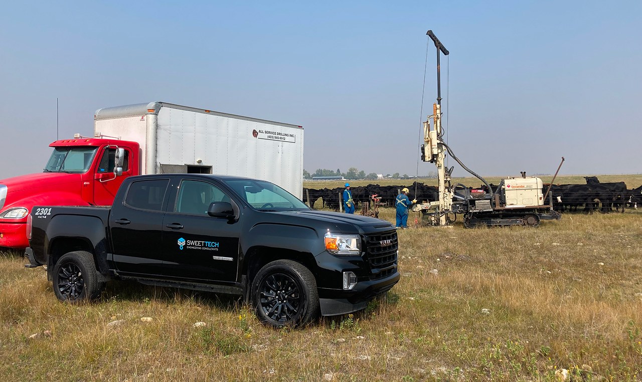 SweetTech field team conducting geotechnical investigation at Rocky Ridge gravel pit development site