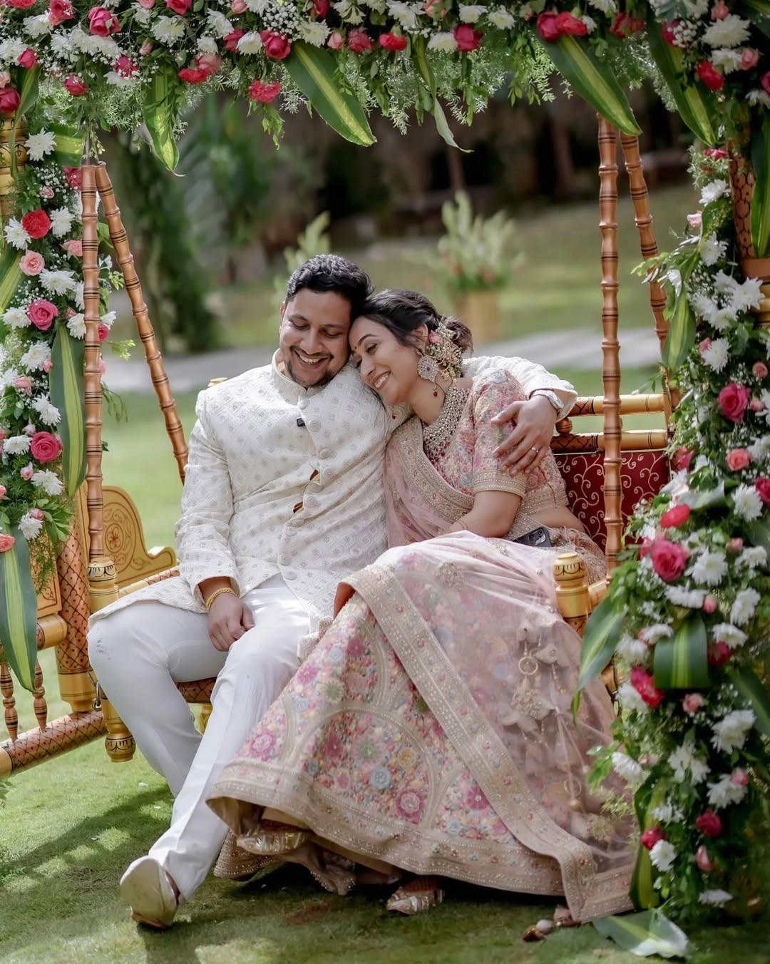girl in white dress holding bouquet of flowers