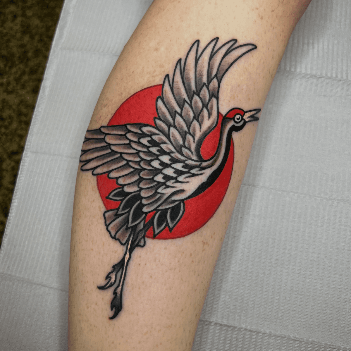 color tattoo of a crane