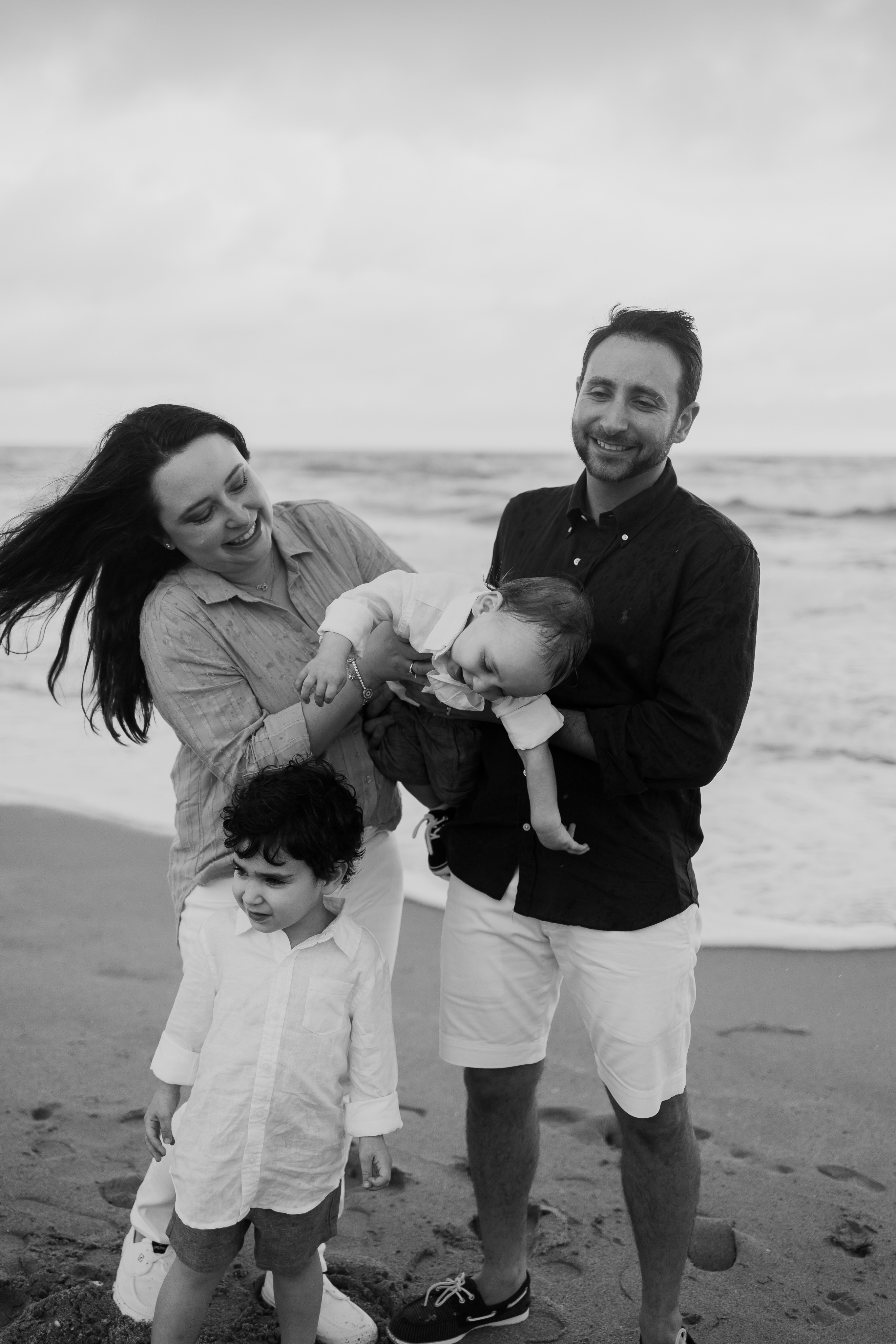 Expert family photography by Zalmy Marrus - Capturing genuine moments and joy in timeless family portraits.