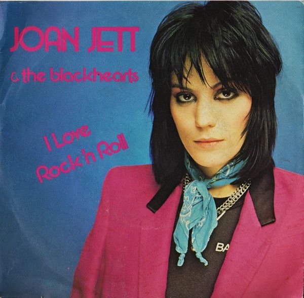 Joan Jett's I love rock'n roll album cover showing Joan with 80s haircut and pink blazer