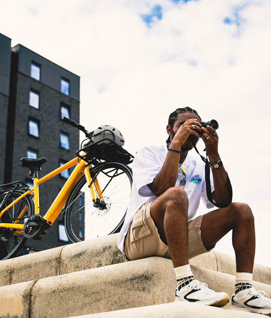 Lifestyle campaign photography for a bicycle brand featuring rider portrait, product styling and outdoor art direction designed to connect with cycling culture