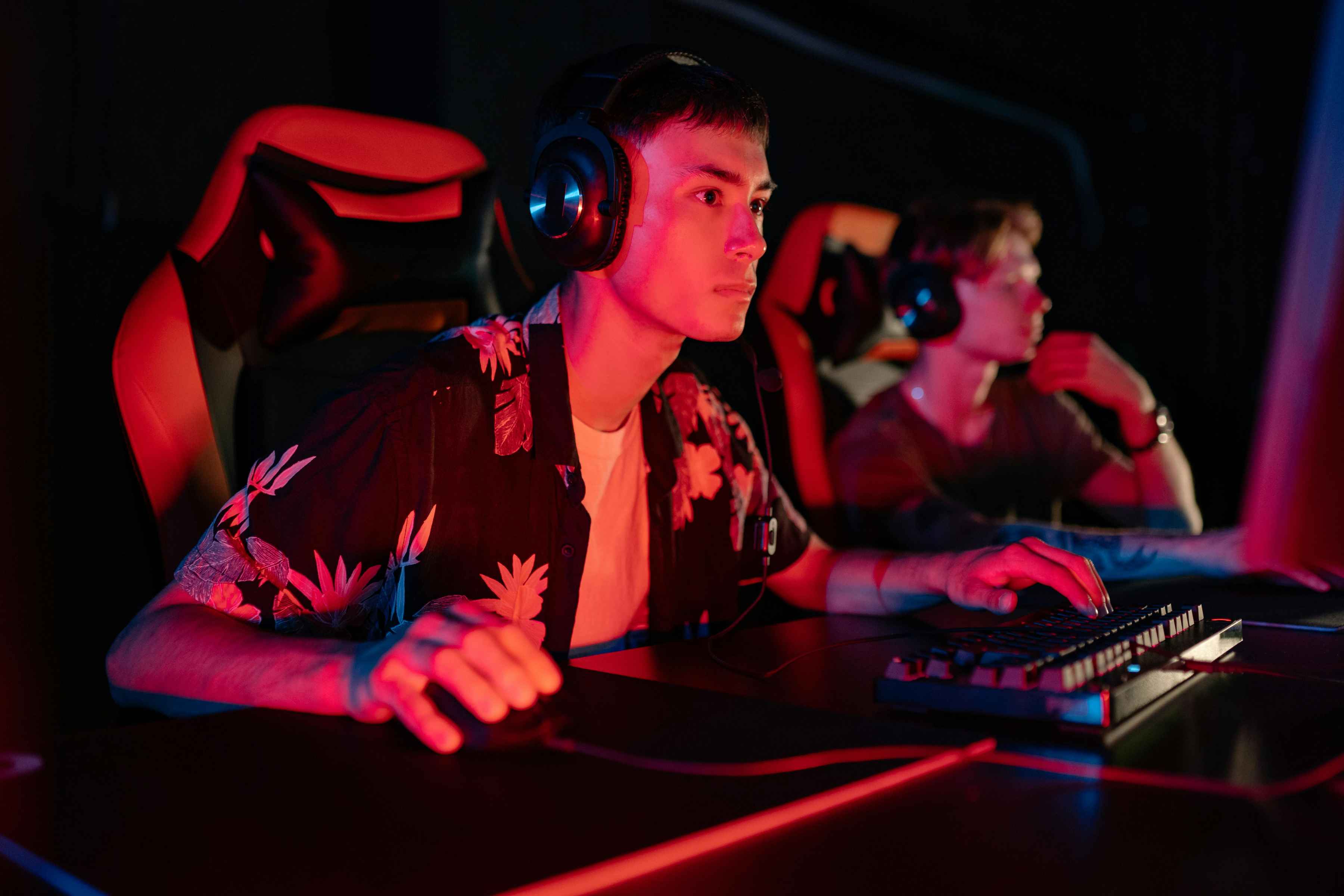 Esports players focused on streaming during a competitive gaming event