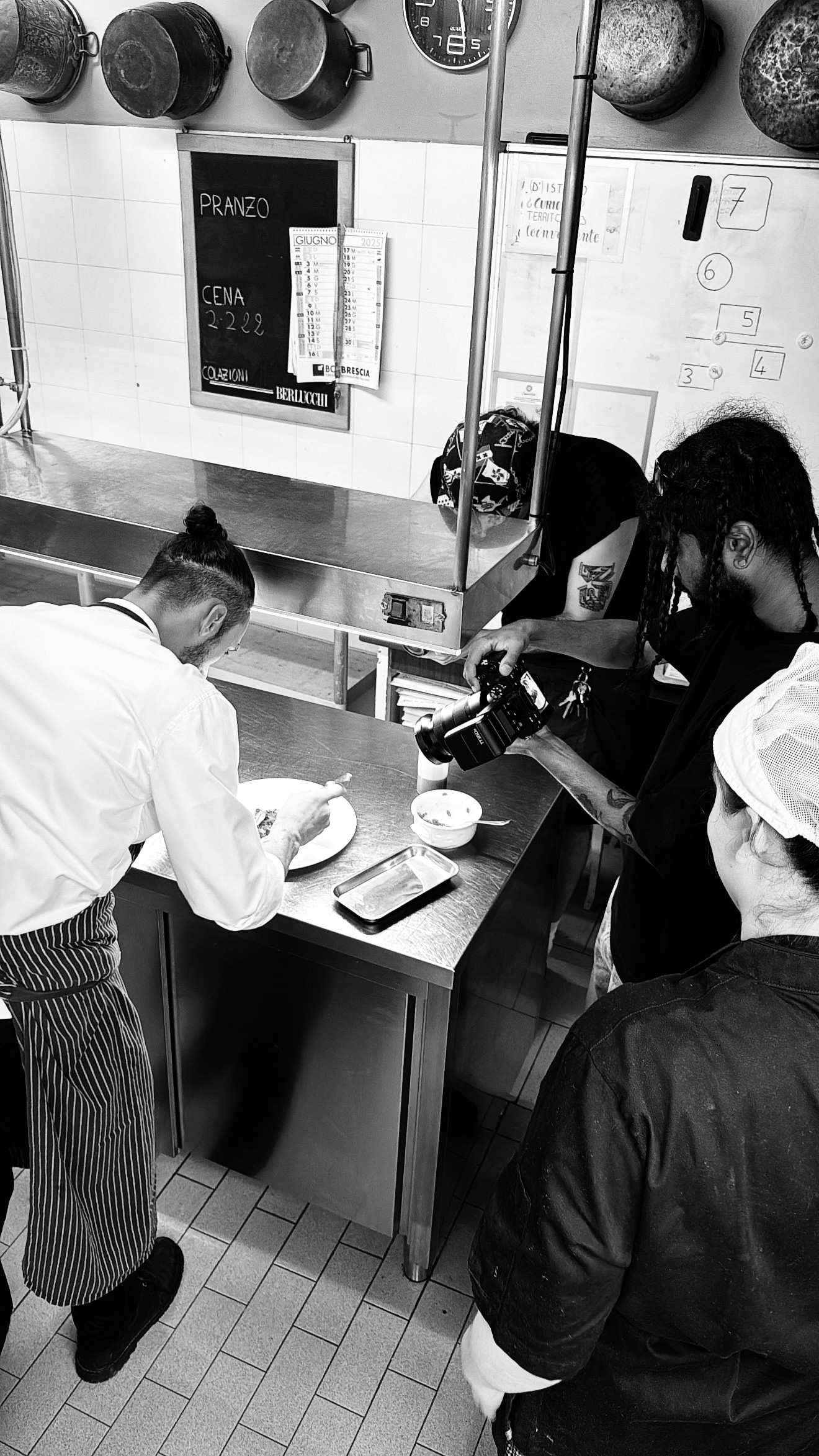 Group of people relaxing outdoors on a field or lawn