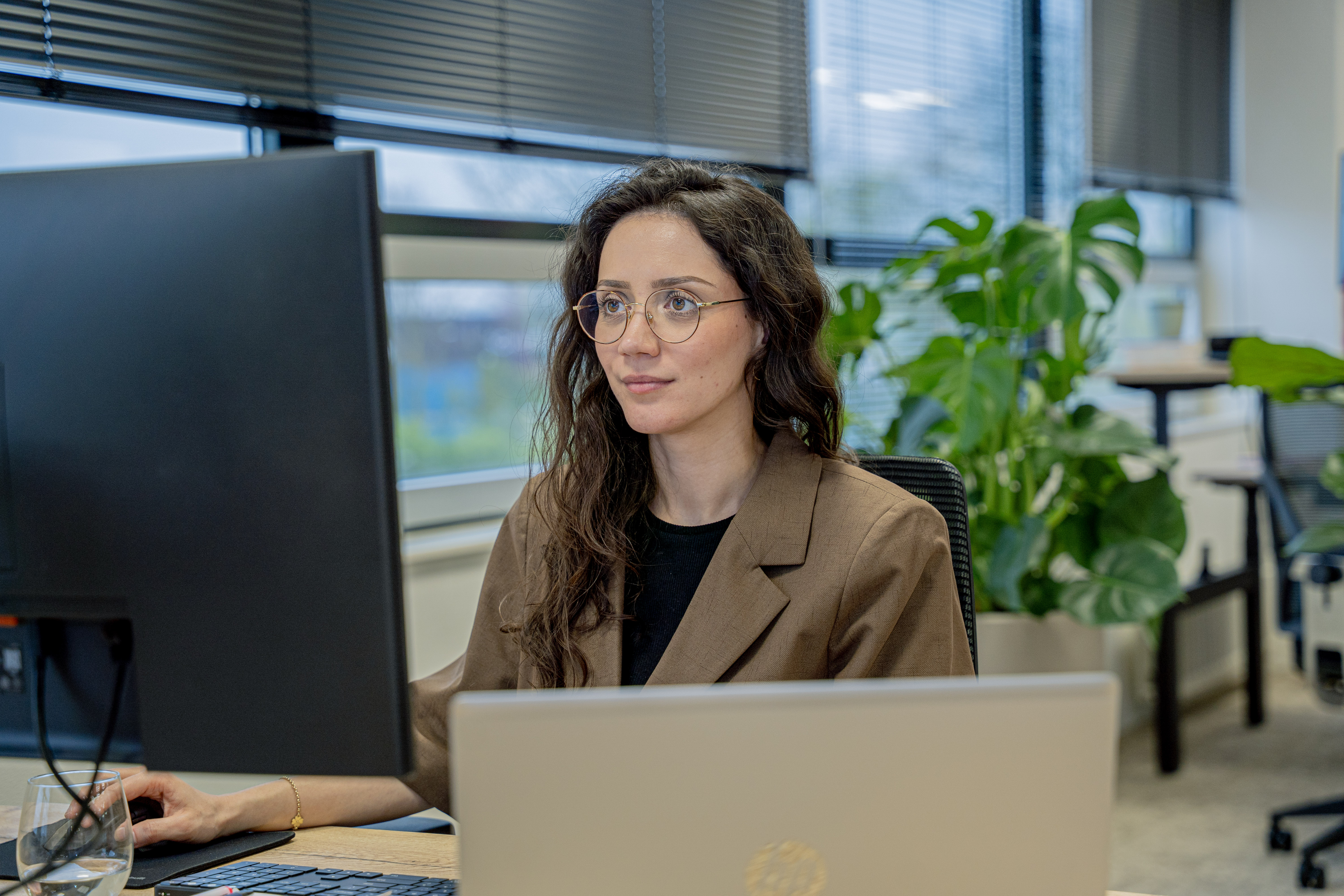 person sitting in a chair in front of a man