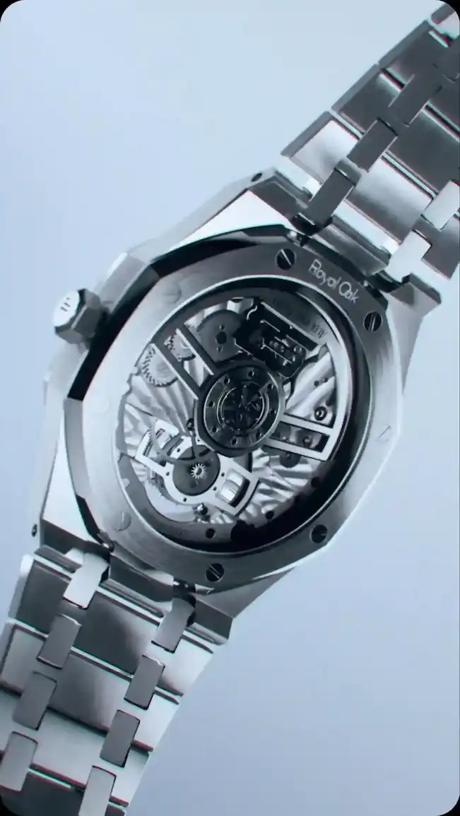 A high-fidelity 3D motion render captures the intricate mechanical movement of an Audemars Piguet Royal Oak watch