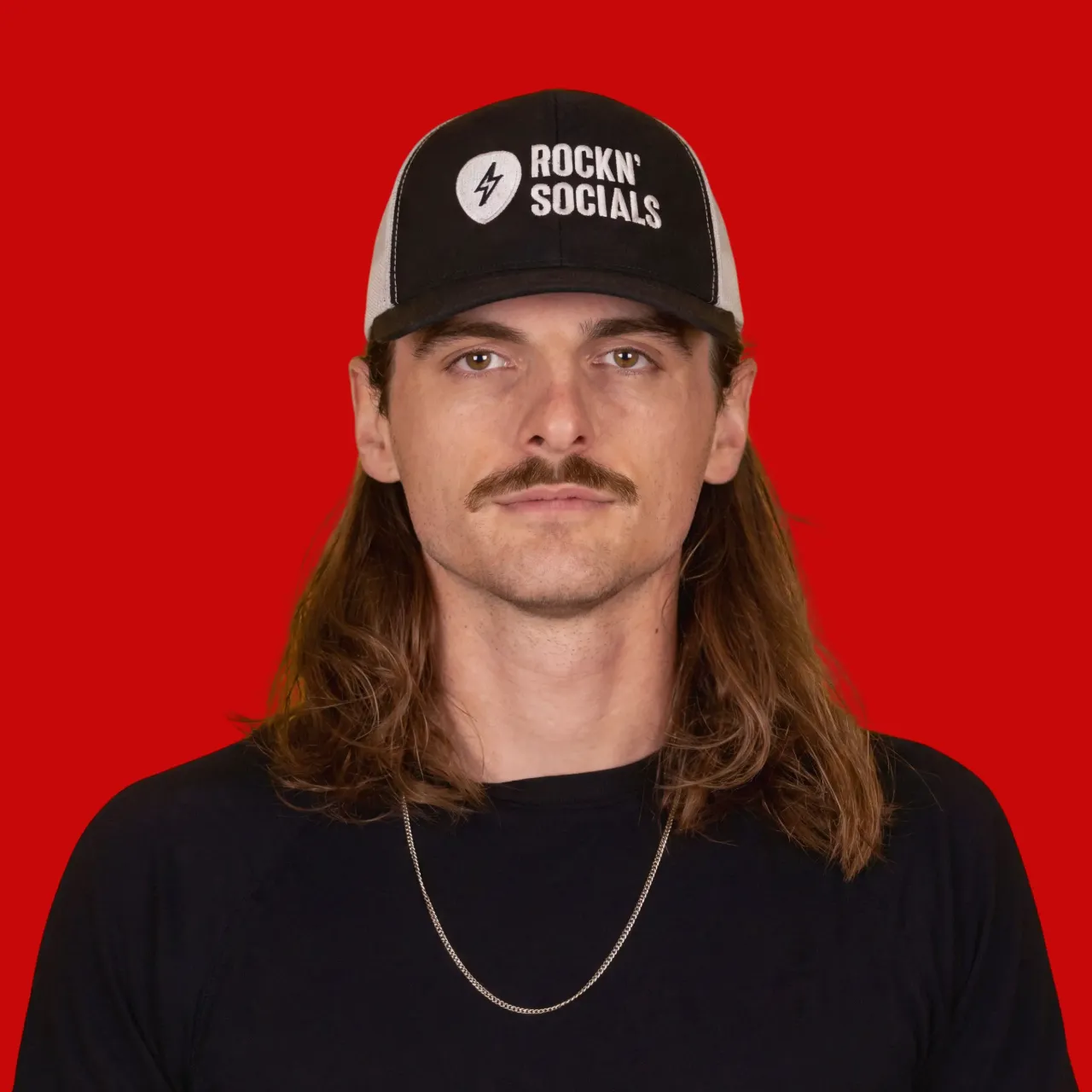 A man wearing a hat and a hat hat