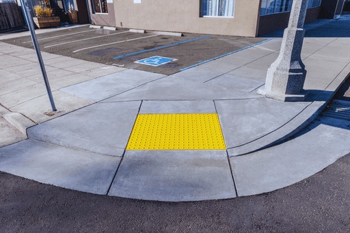 Concrete ADA ramp with truncated domes