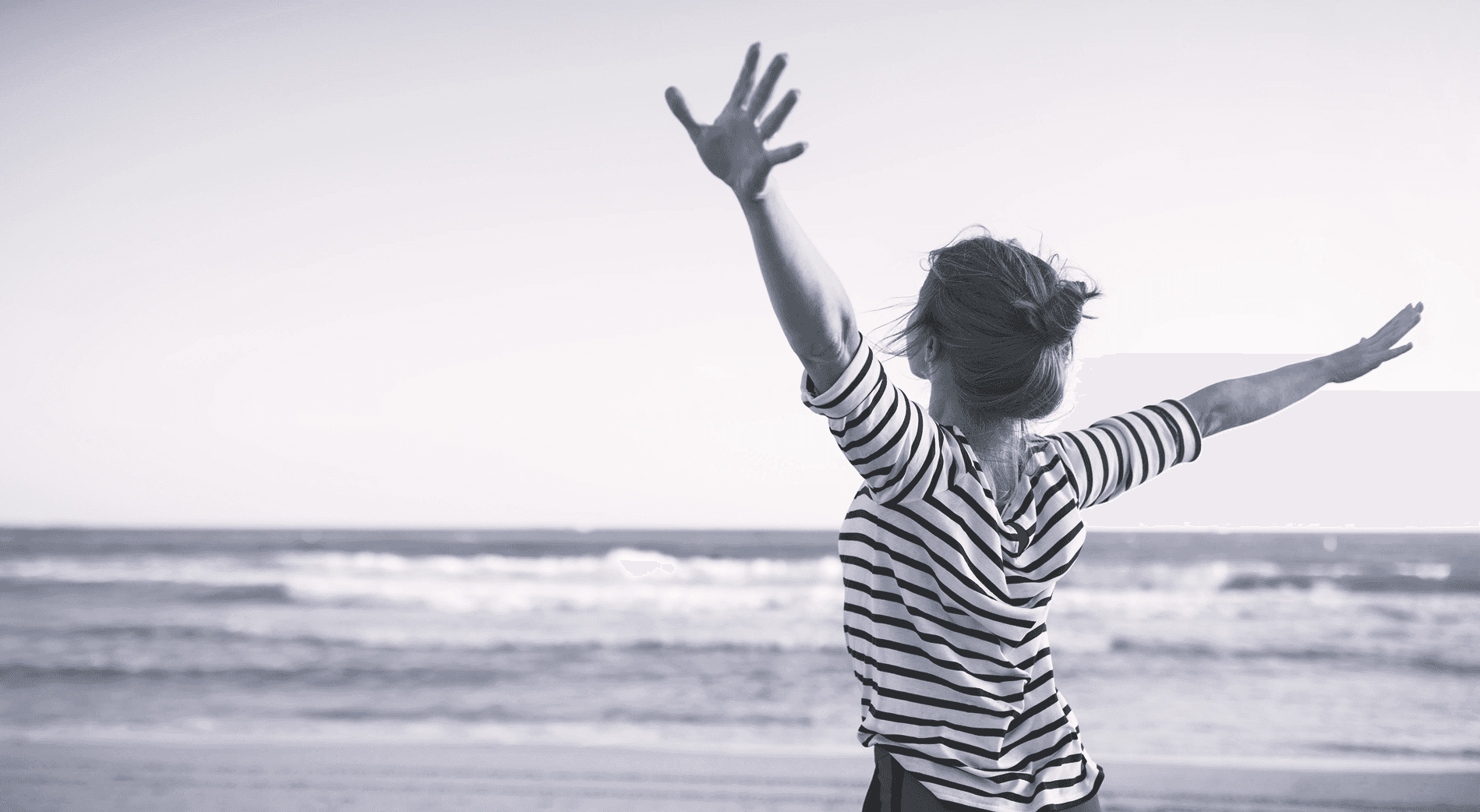 Artistic black and white image of an outstretched hand