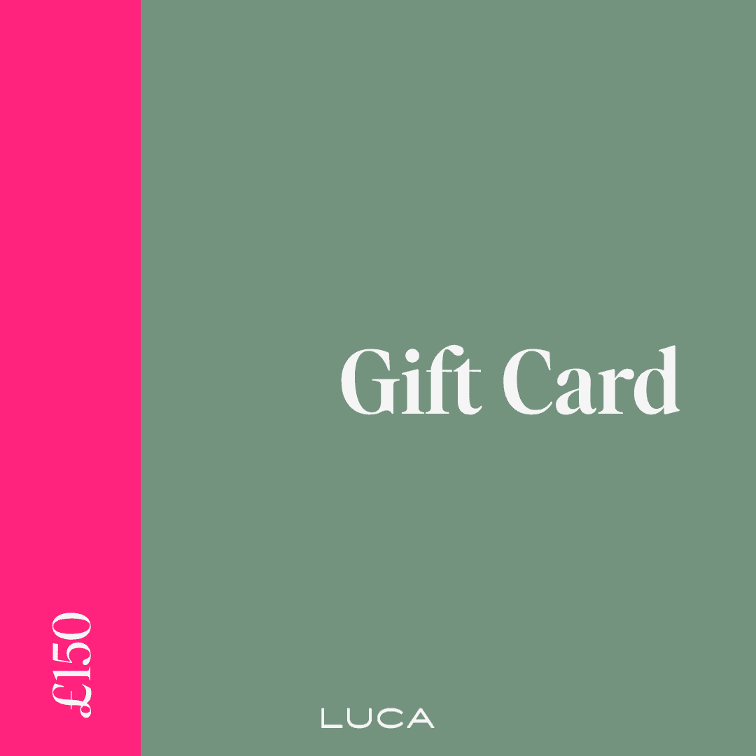 Cyclist tying ponytail with LUCA Uplift scrunchie in matcha, arms raised