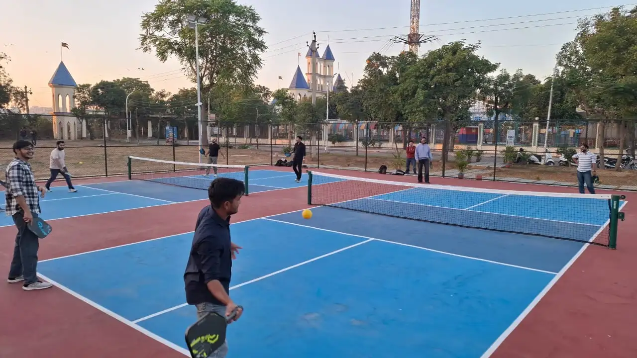 Warm modern orange living room with sofa, lamp.