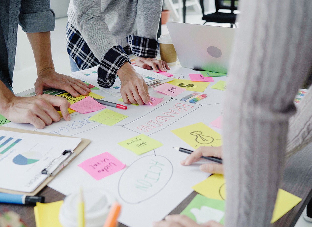 group casually dressed business people discussing ideas office
