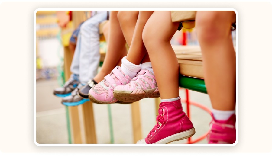 Children wearing colorful sneakers