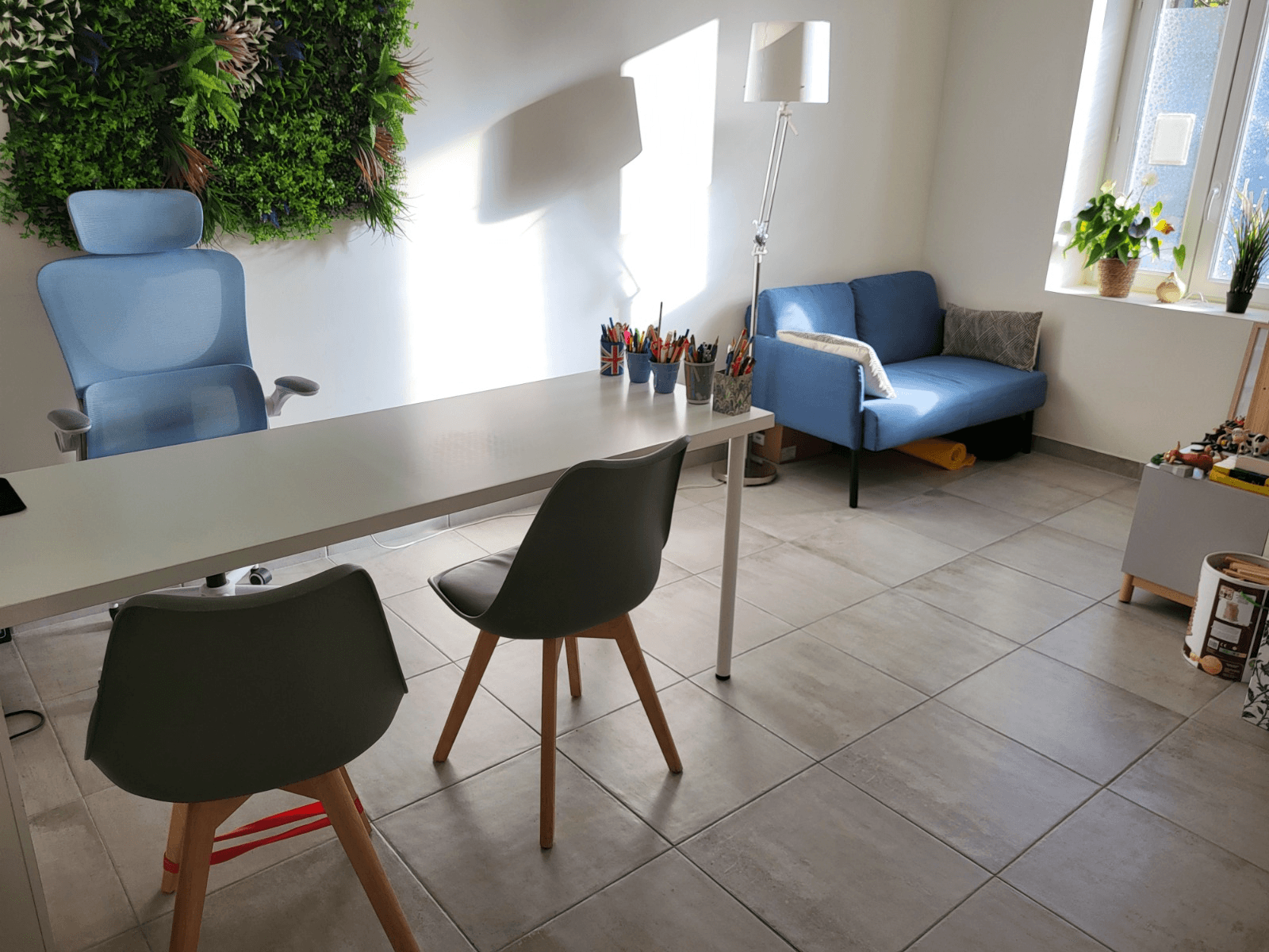 a room with a table and chairs