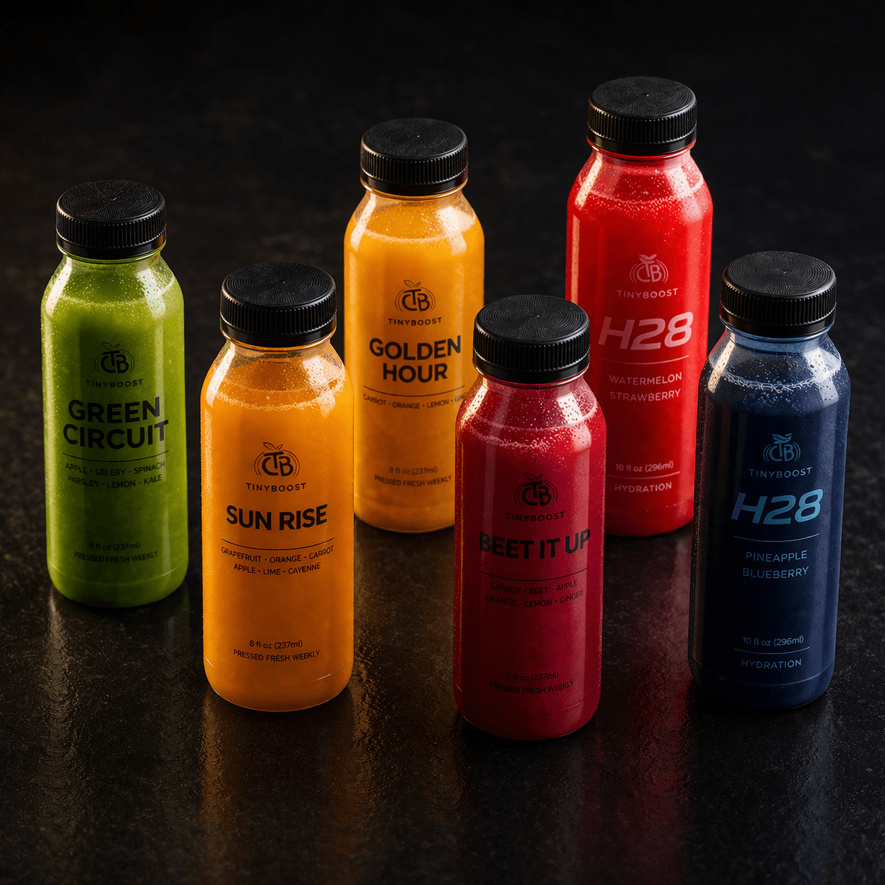 TinyBoost cold-pressed juice and hydration bottles in six flavours.