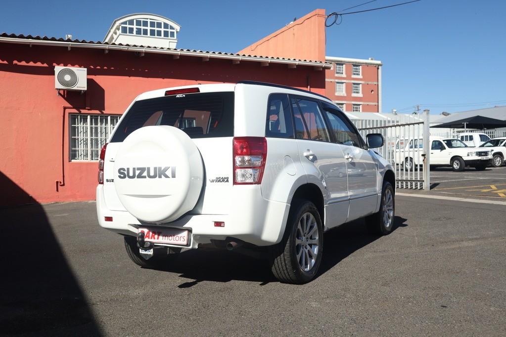 man in white crew neck shirt wearing black framed eyeglasses