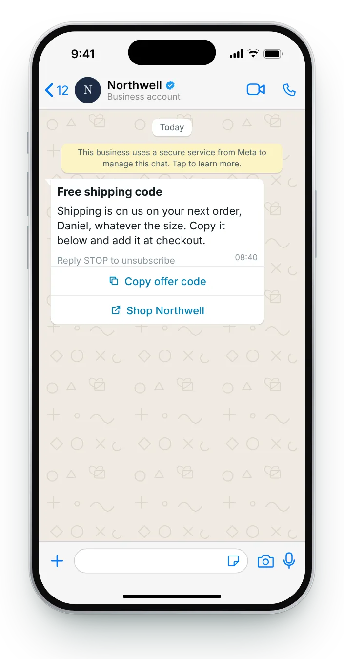 Delivery covered, prices untouched: WhatsApp coupon code message on an iPhone
