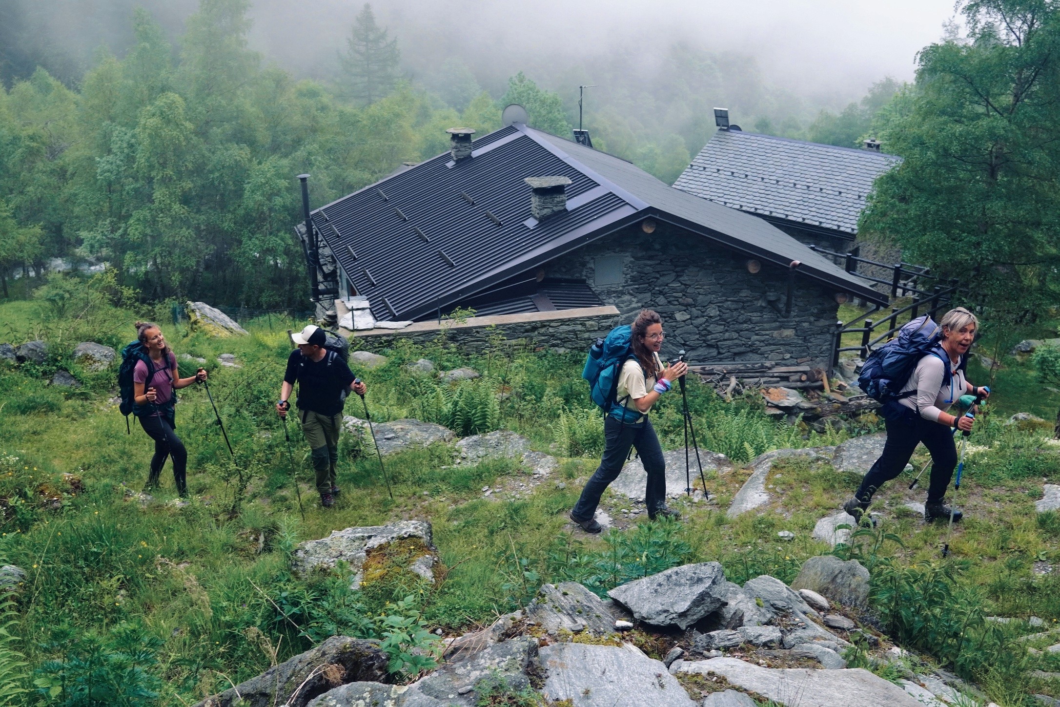 Hikers passing a refugio