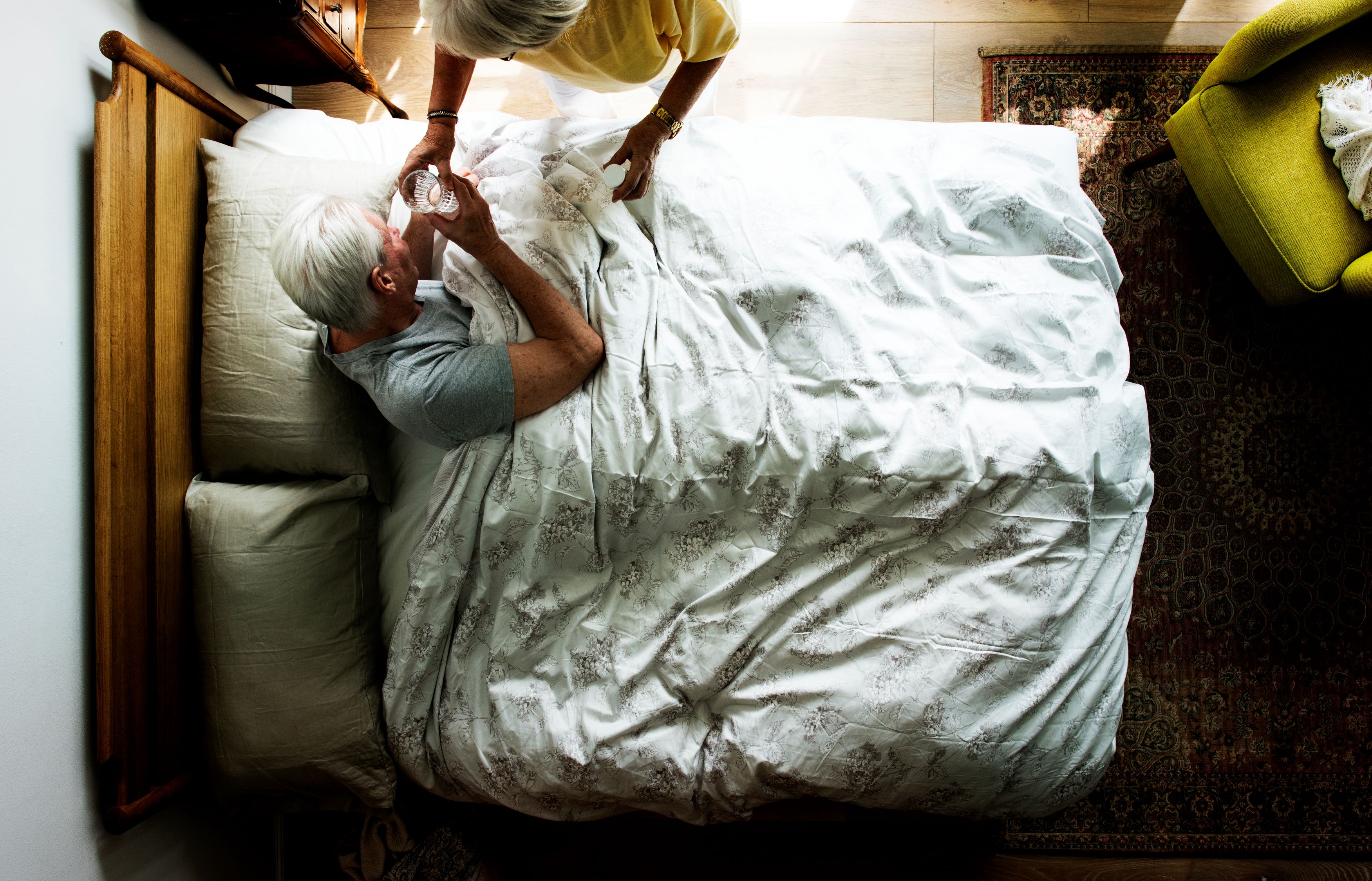 elderly taking medicine