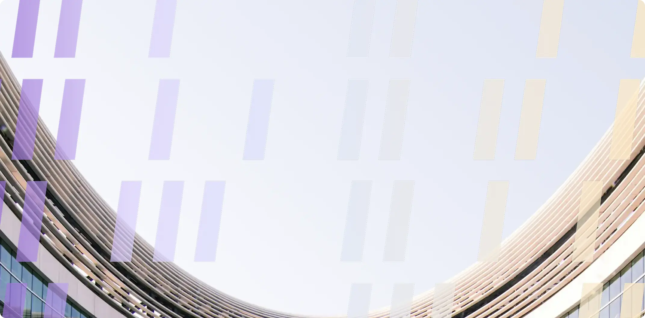 Curved building paned up to the sky
