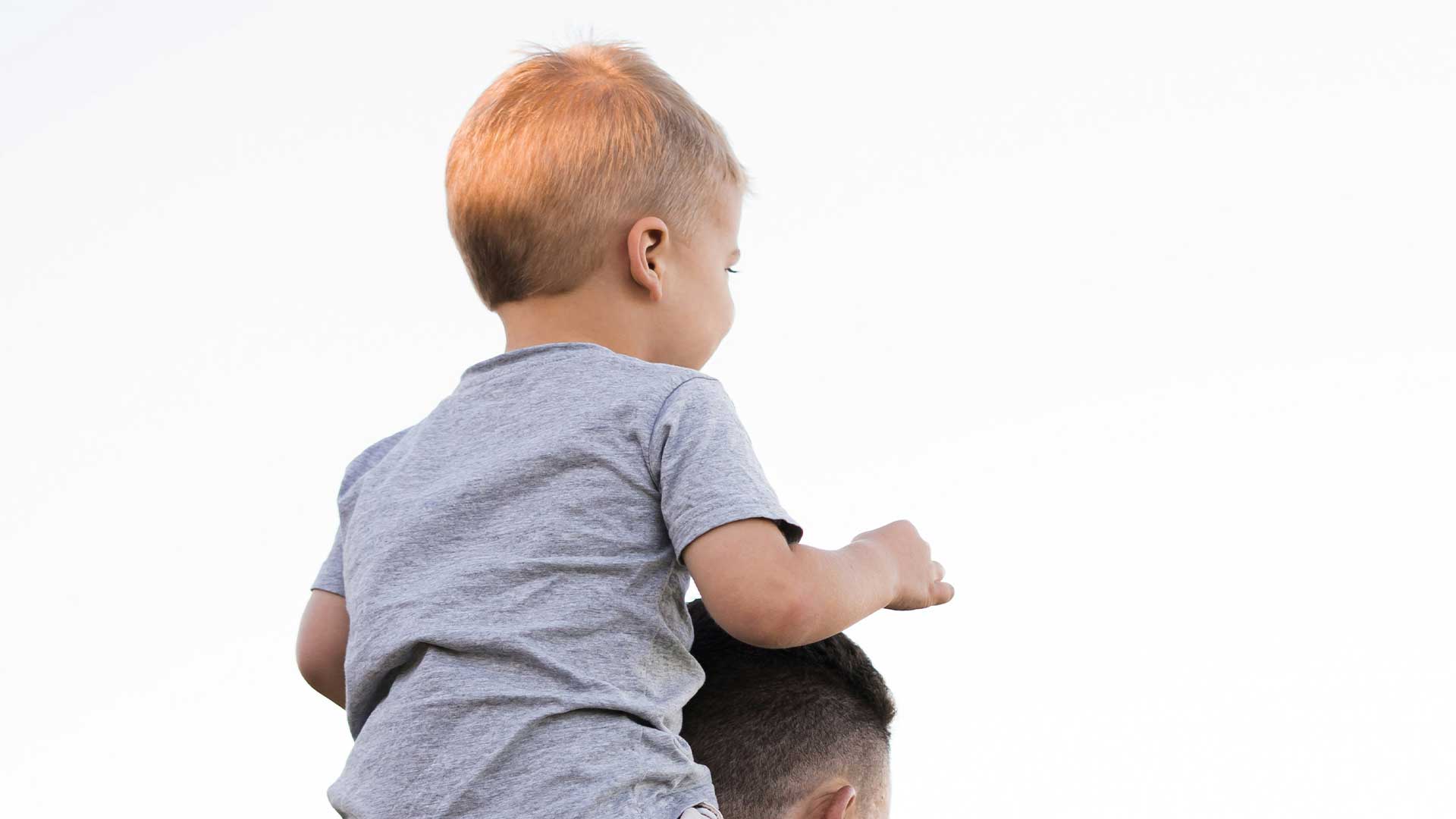 Child enjoying time with a parent, highlighting family law and custody support.