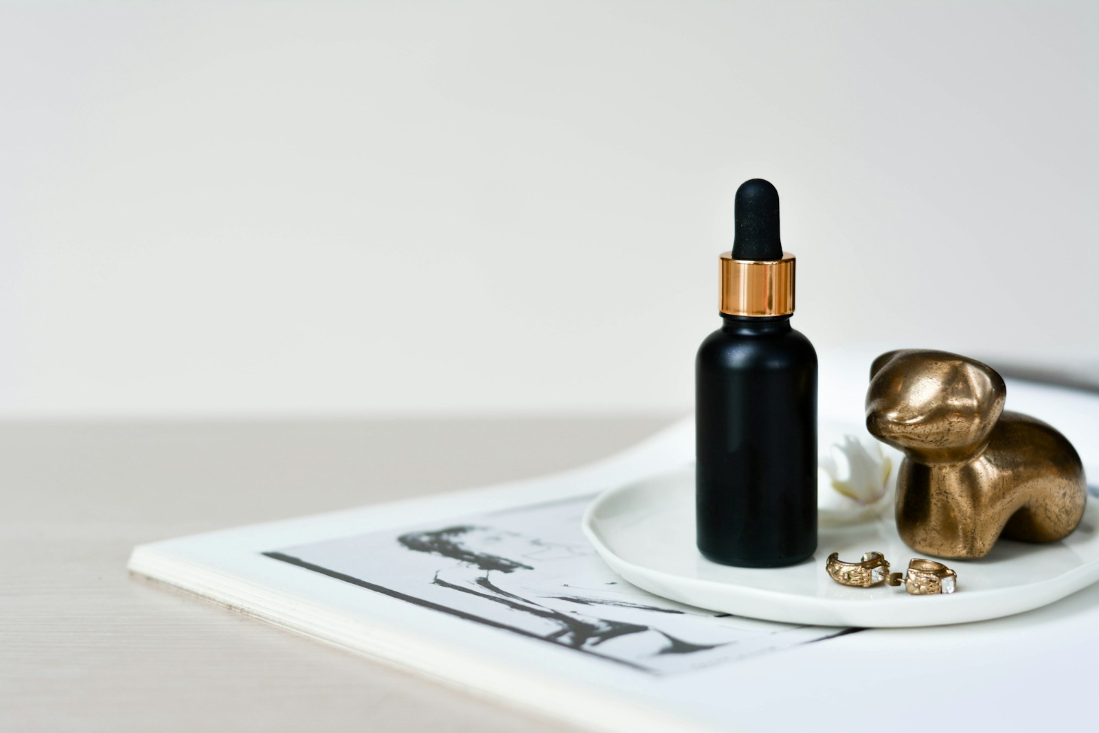 Unlabeled dropper bottle on a white tray