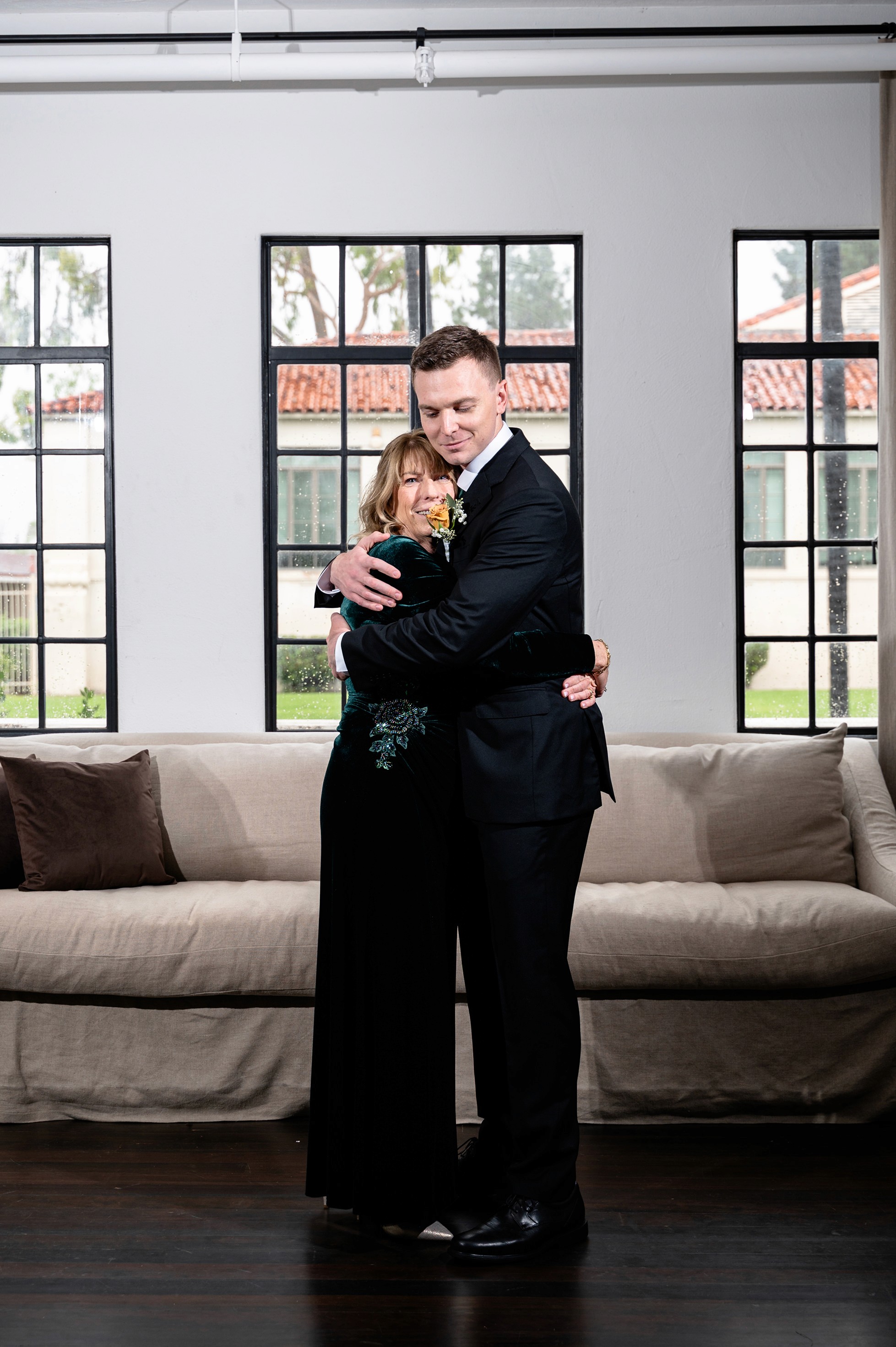 Flat lay wedding details with bouquet, rings, and sparkling bridal heels