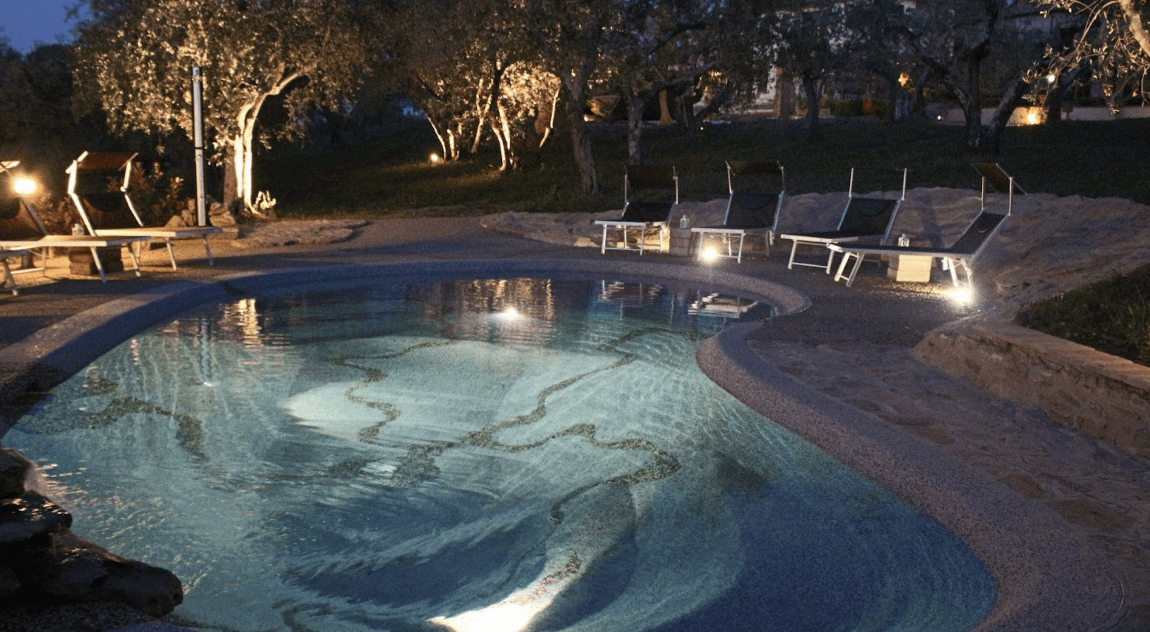 Beautiful landscaped garden with greenery and outdoor design elements.