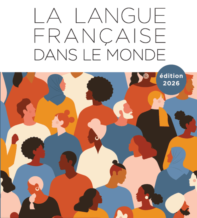 Fireworks illuminate the night sky above a city.