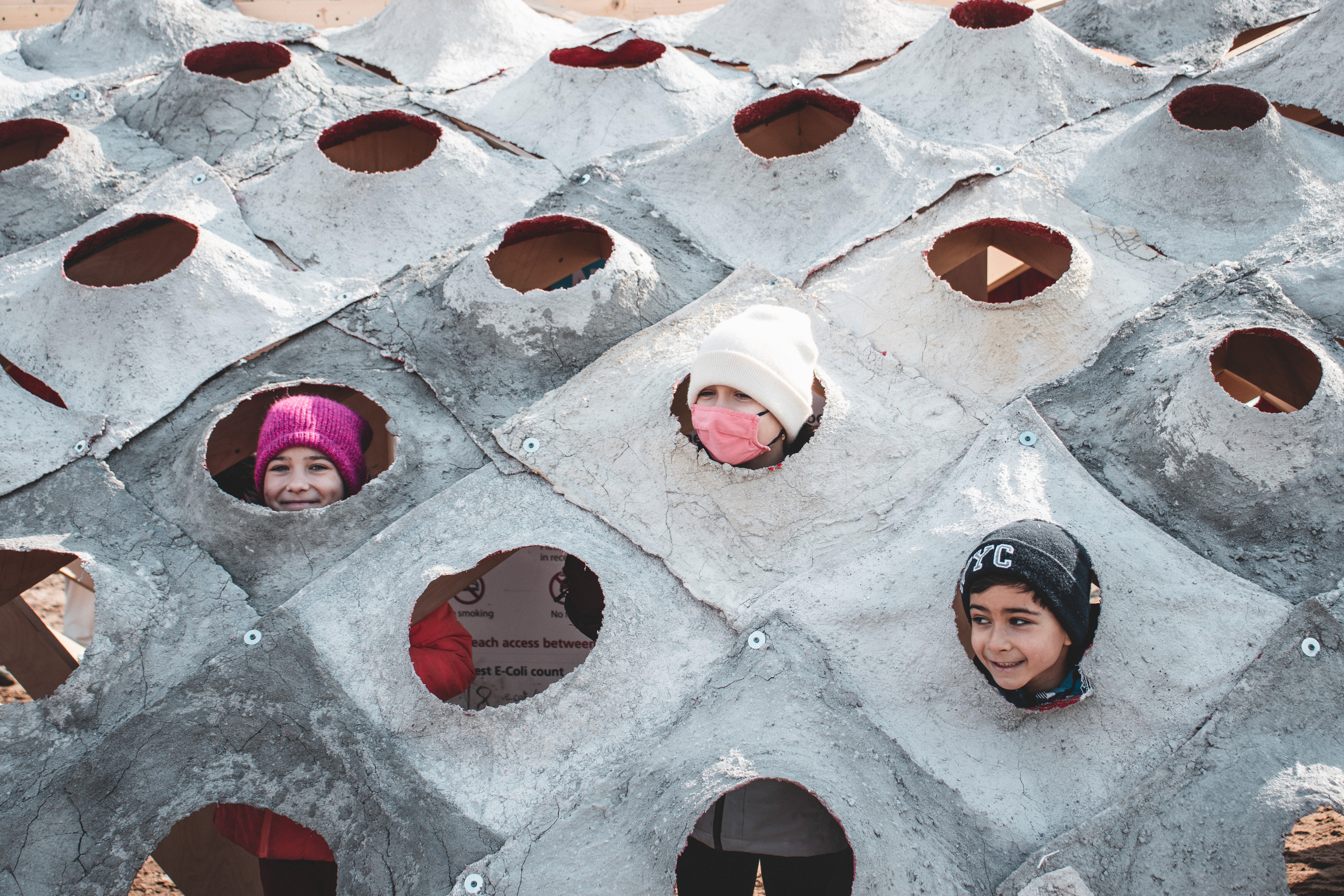 S’Winter Station exhibited on family day with children and pets enjoying the concrete apertures.