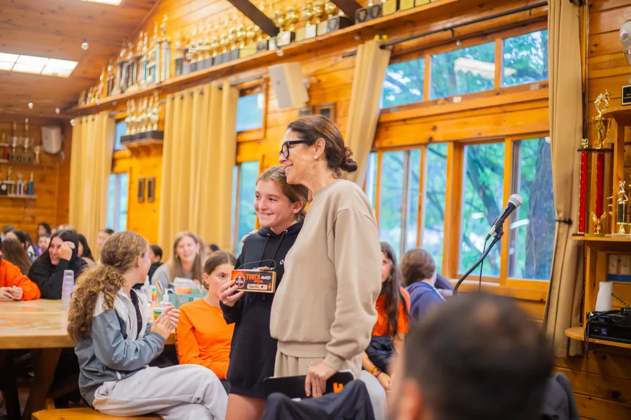 Stephanie Moss with campers in the Camp Lenox dining hall