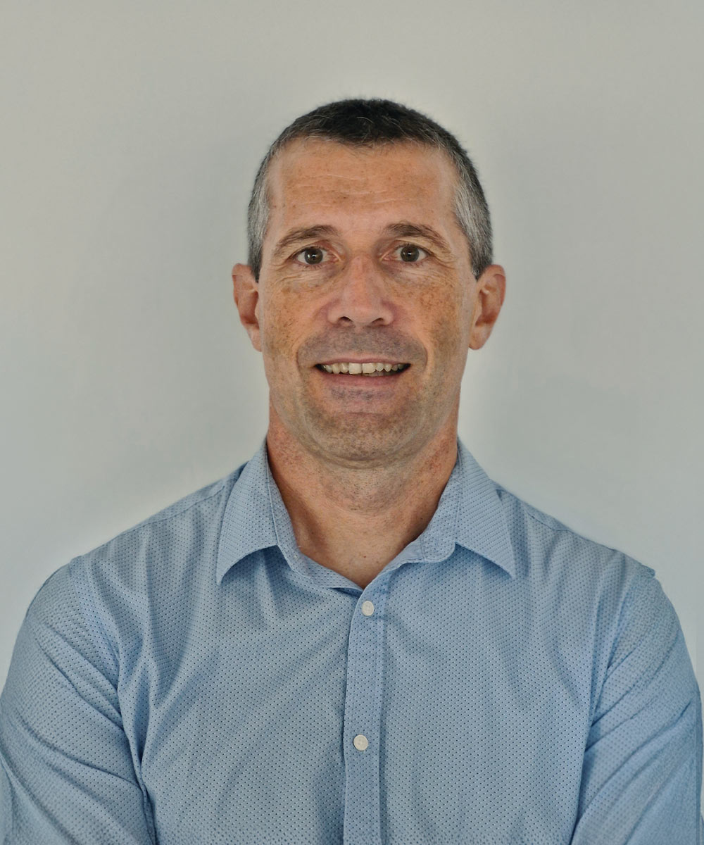 Profile portrait with natural lighting featuring long blonde hair