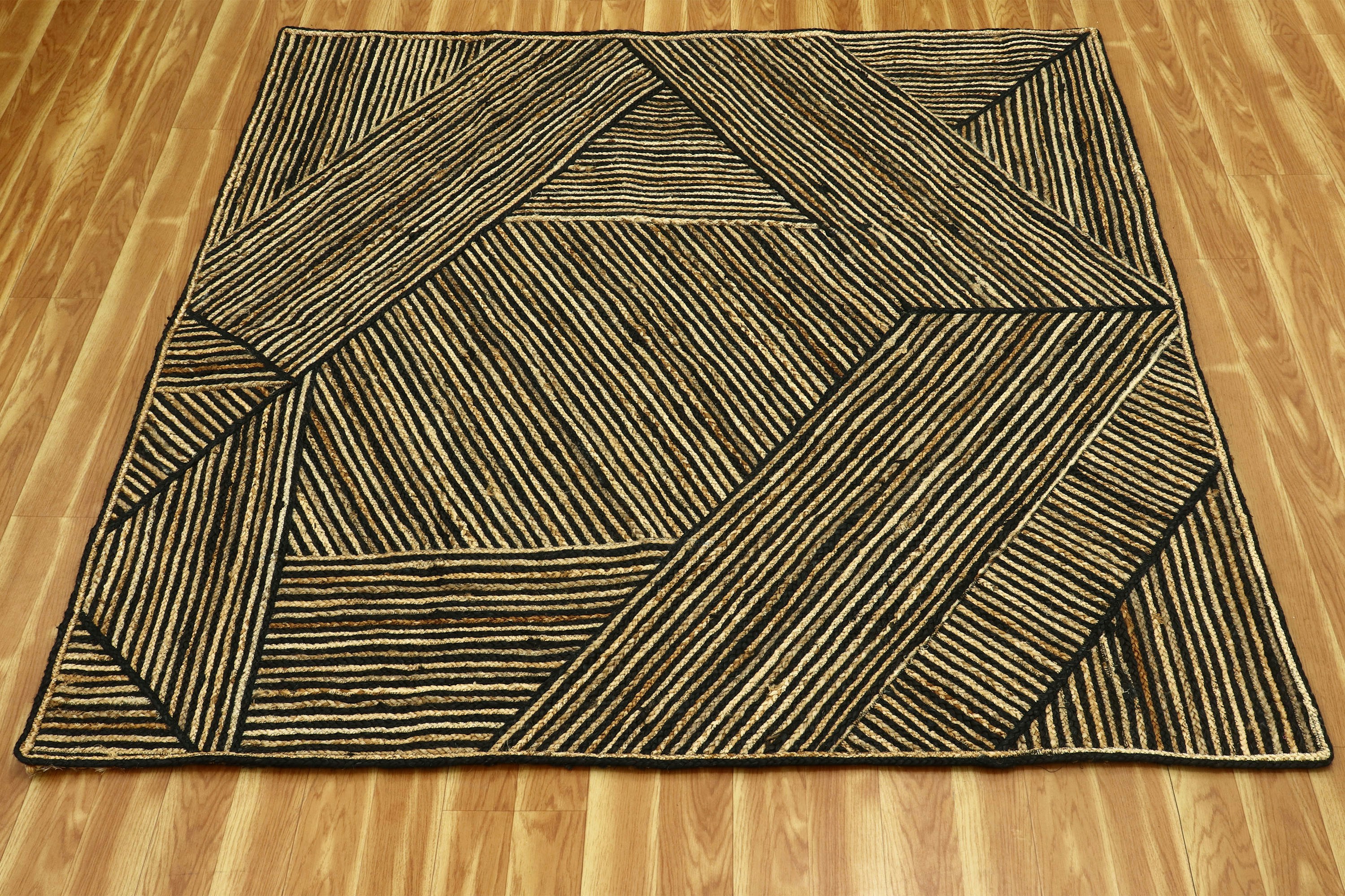 A wooden floor with a rug on top of it