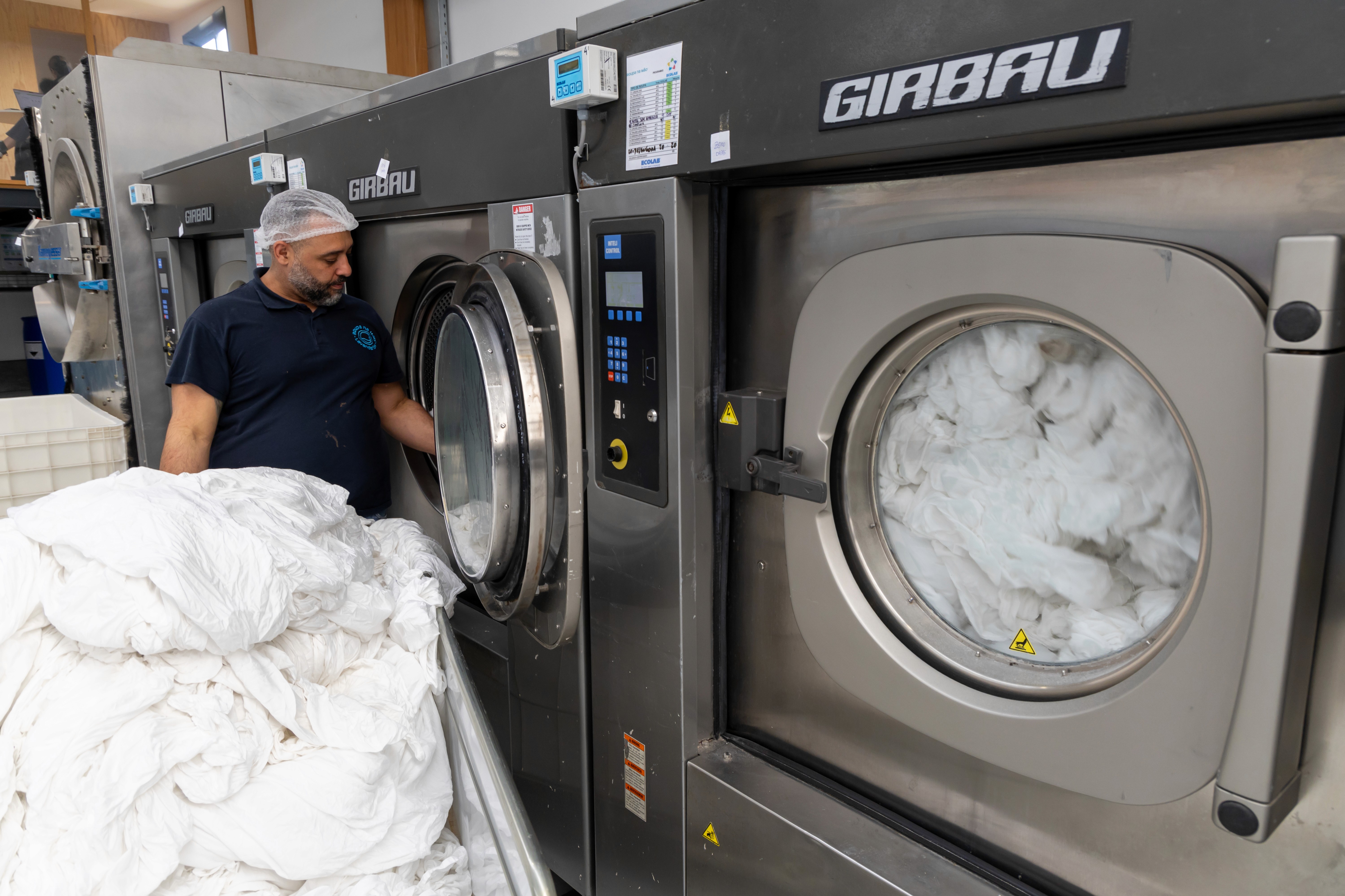 man sitting beside woman looking at a contract on DocuSign