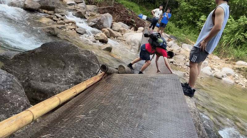  Gang and I crossing a broken bridge 