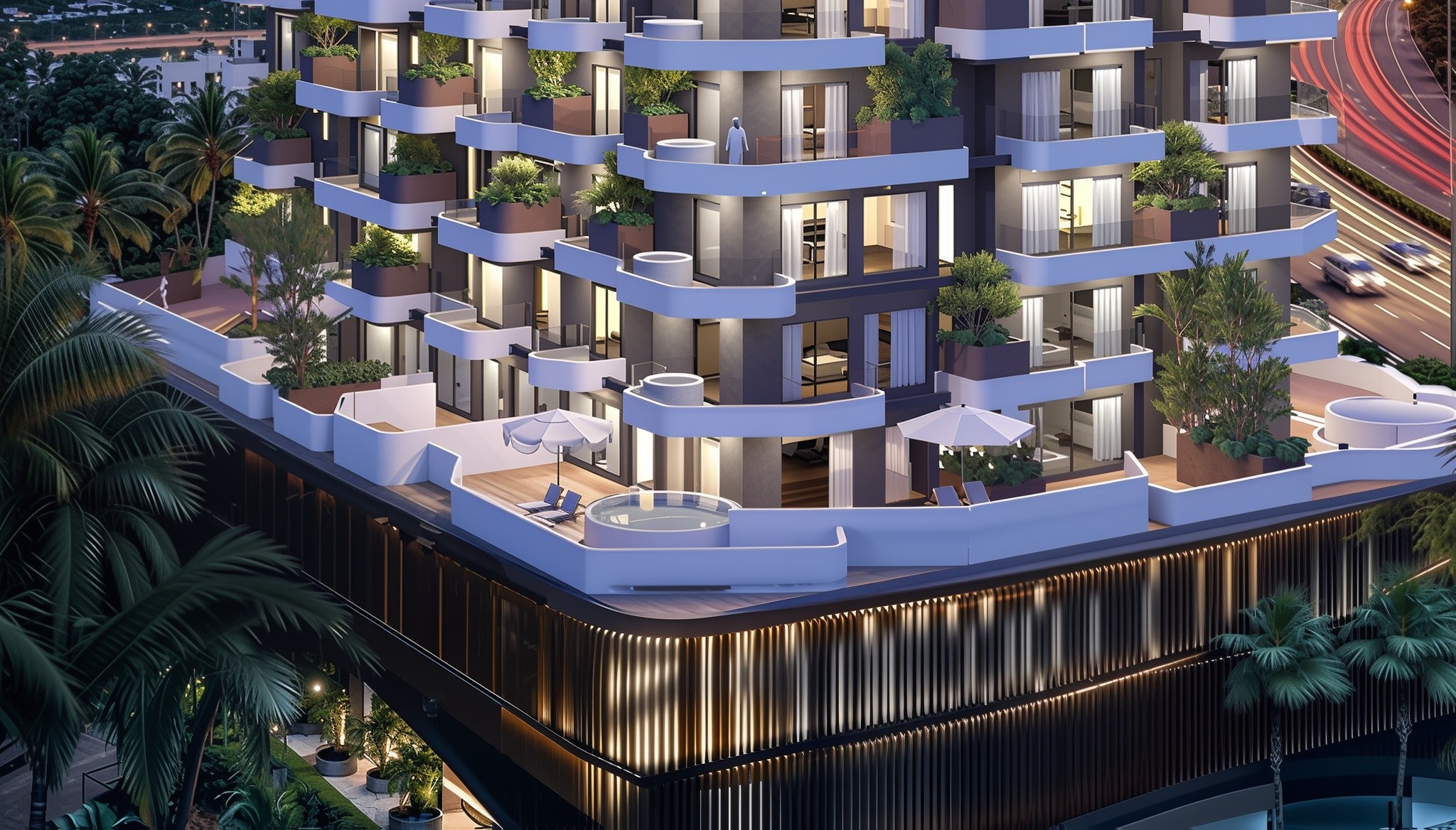 A tall building, Marea Residences, topped with a flourishing garden of plants, enhancing its urban landscape.