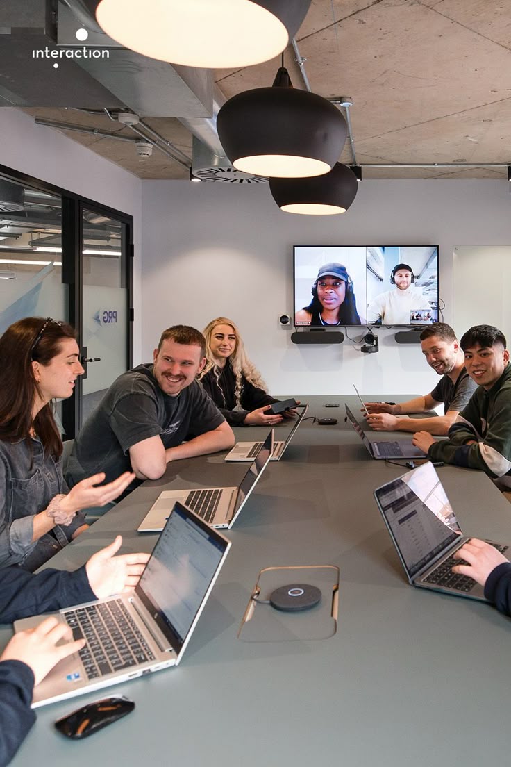 people laughing and talking outside during daytime