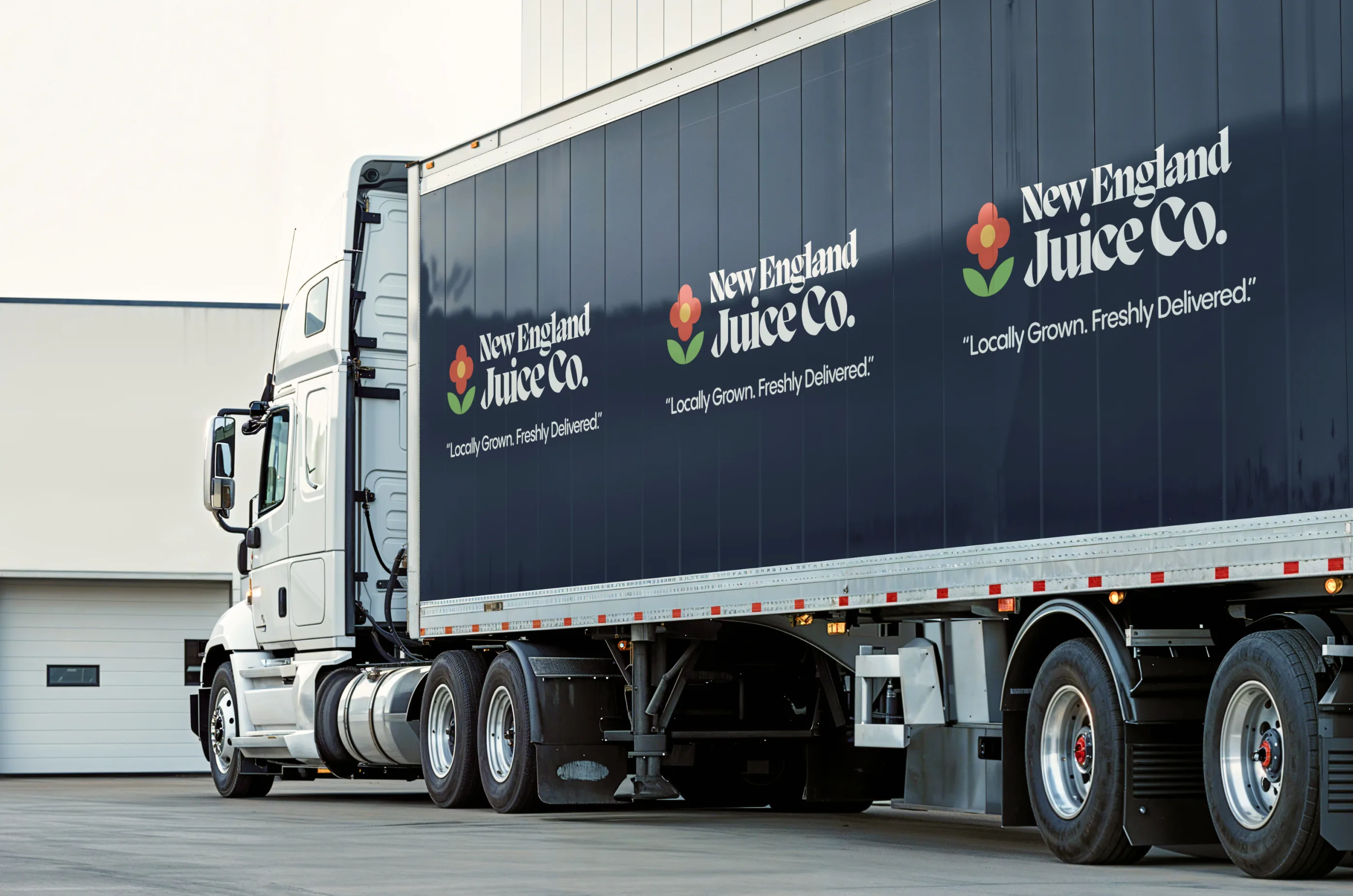 New England Juice Co. — Branded tractor trailer with NEJC logo — Fleet branding