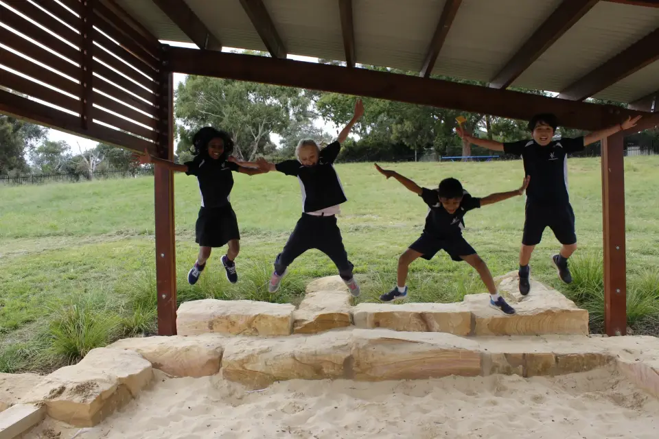 Children in a park jumping