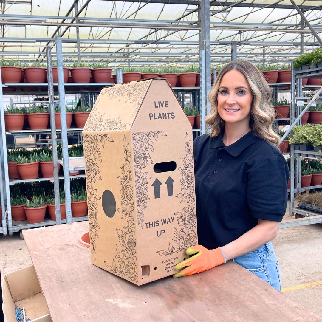a blue and white checkered bag with yellow utensils in it