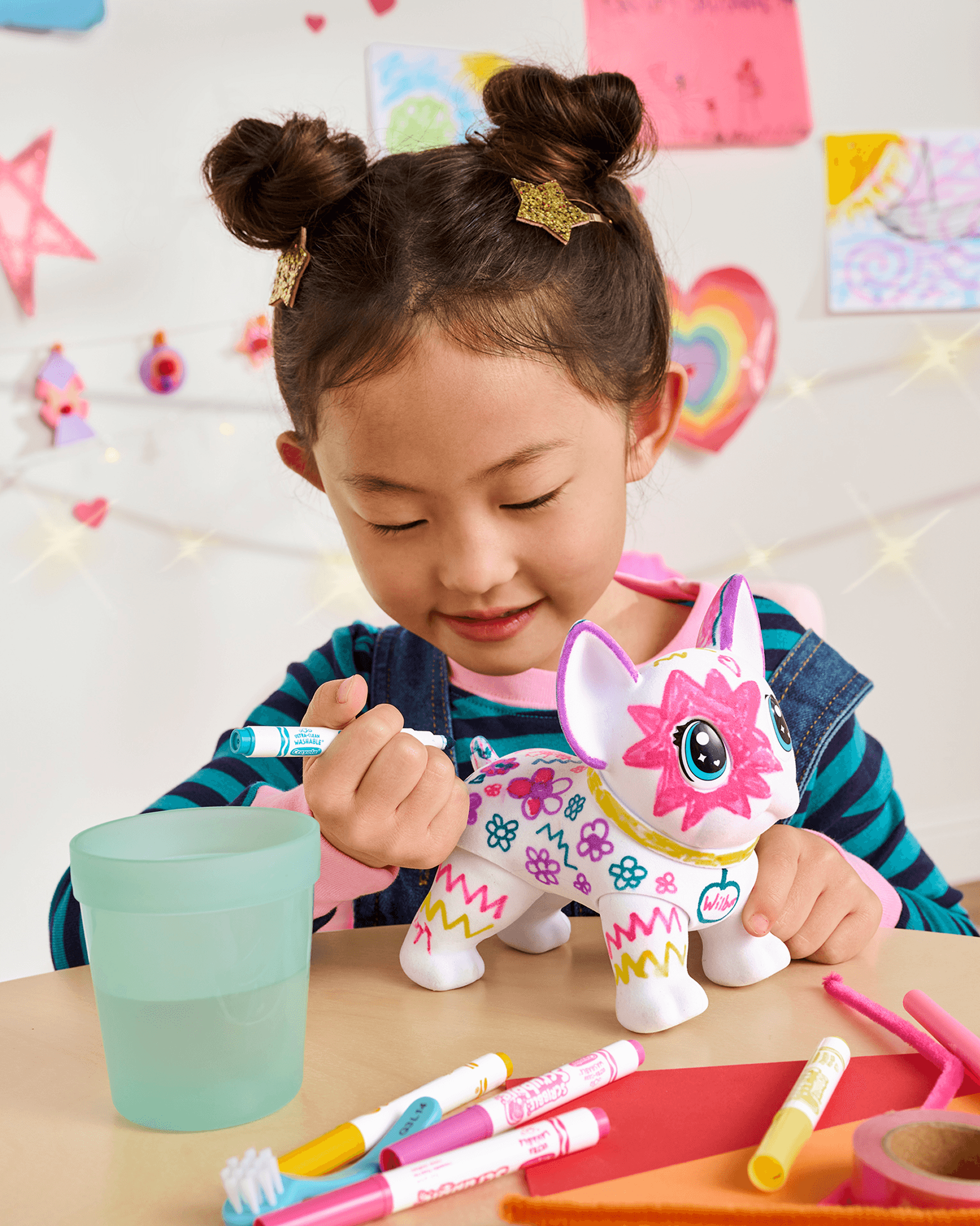 Streetside billboard with flyposters of the Batch.Works brand and illustrations