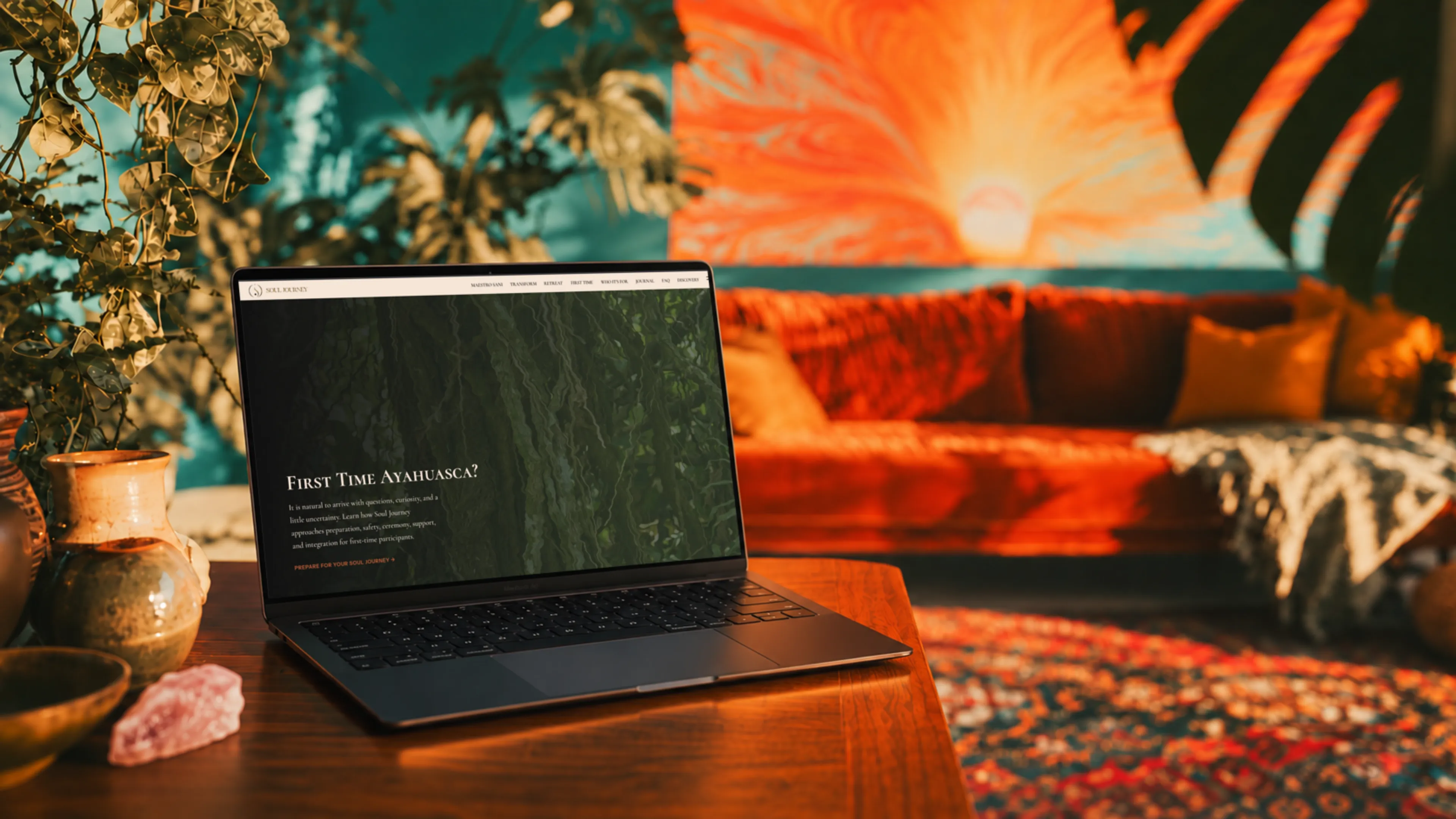 MacBook Air displaying the First Time Ayahuasca page in a warm bohemian interior