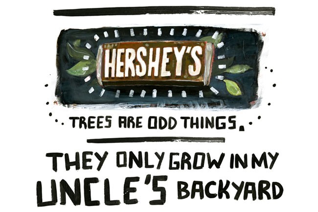 The image is a hand-drawn illustration on a plain white background. It features a black rectangular shape with a brown Hershey's chocolate bar in the center, decorated with green leaves. Around the chocolate bar are white dashes resembling a border. Below the chocolate bar, the text "TREES ARE ODD THINGS." is written in white, followed by "THEY ONLY GROW IN MY UNCLE'S BACKYARD" in black. The illustration is done in a casual, handwritten style with black ink on a white background.