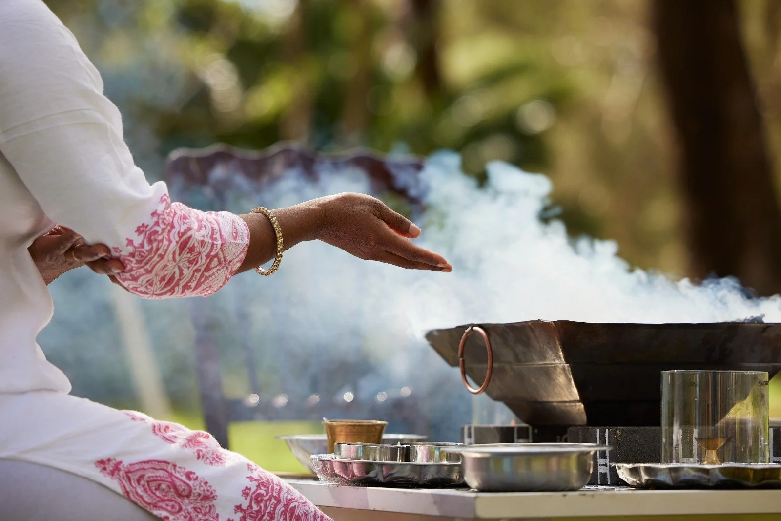 A couple in formal wedding attire embraces intimately in a vast.