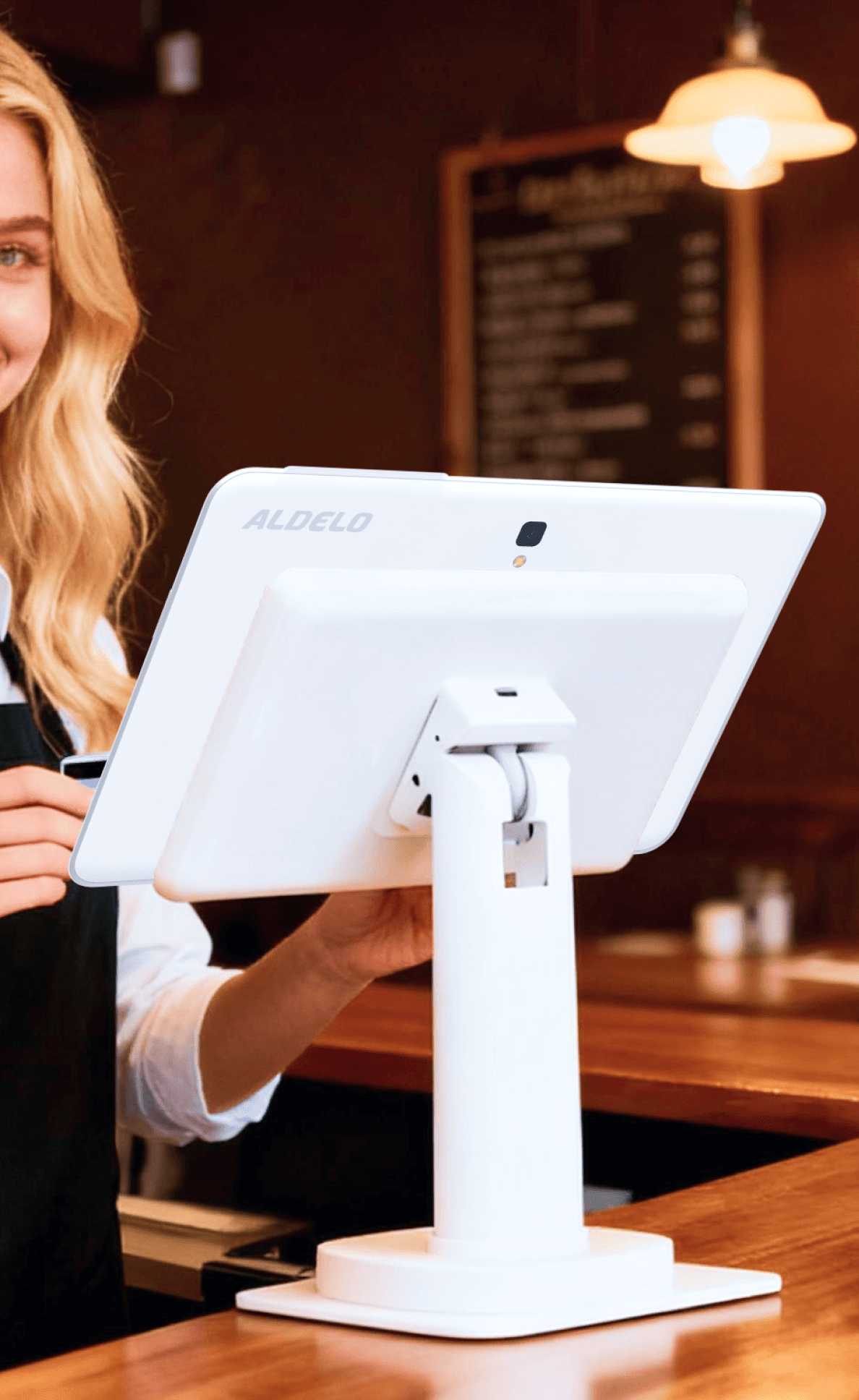 The staff member is operating the Aldelo Express - Restaurant POS.