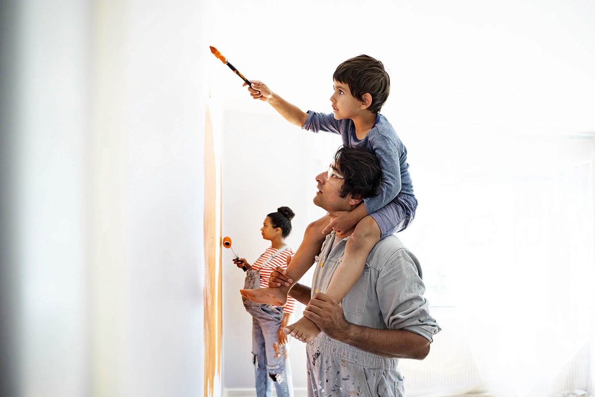 Family painting a room together